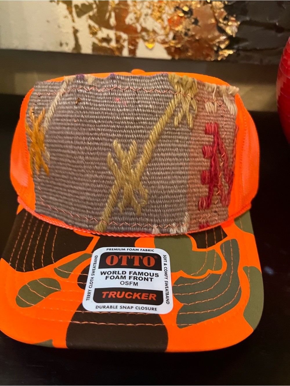 Kilim Patch Neon Orange Camo Foam Trucker Hat with Embroidered Front